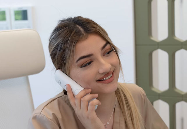 Women holding telephone