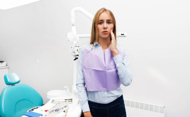 woman showing toothache pain
